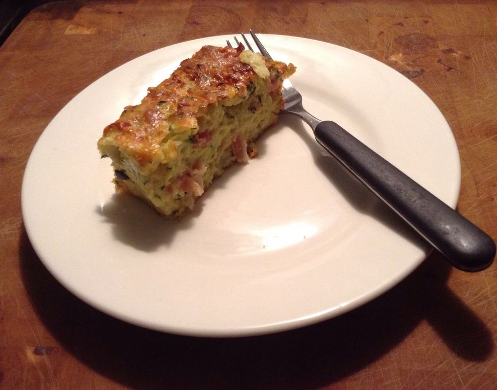 Remove from oven and cut into slices \ud83c\udf74. Can be enjoyed hot or cold. Great for school lunch boxes.