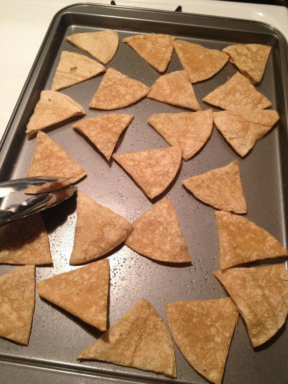 Remove from oven and flip over the chips. Place back in oven for another 7-8 minutes.