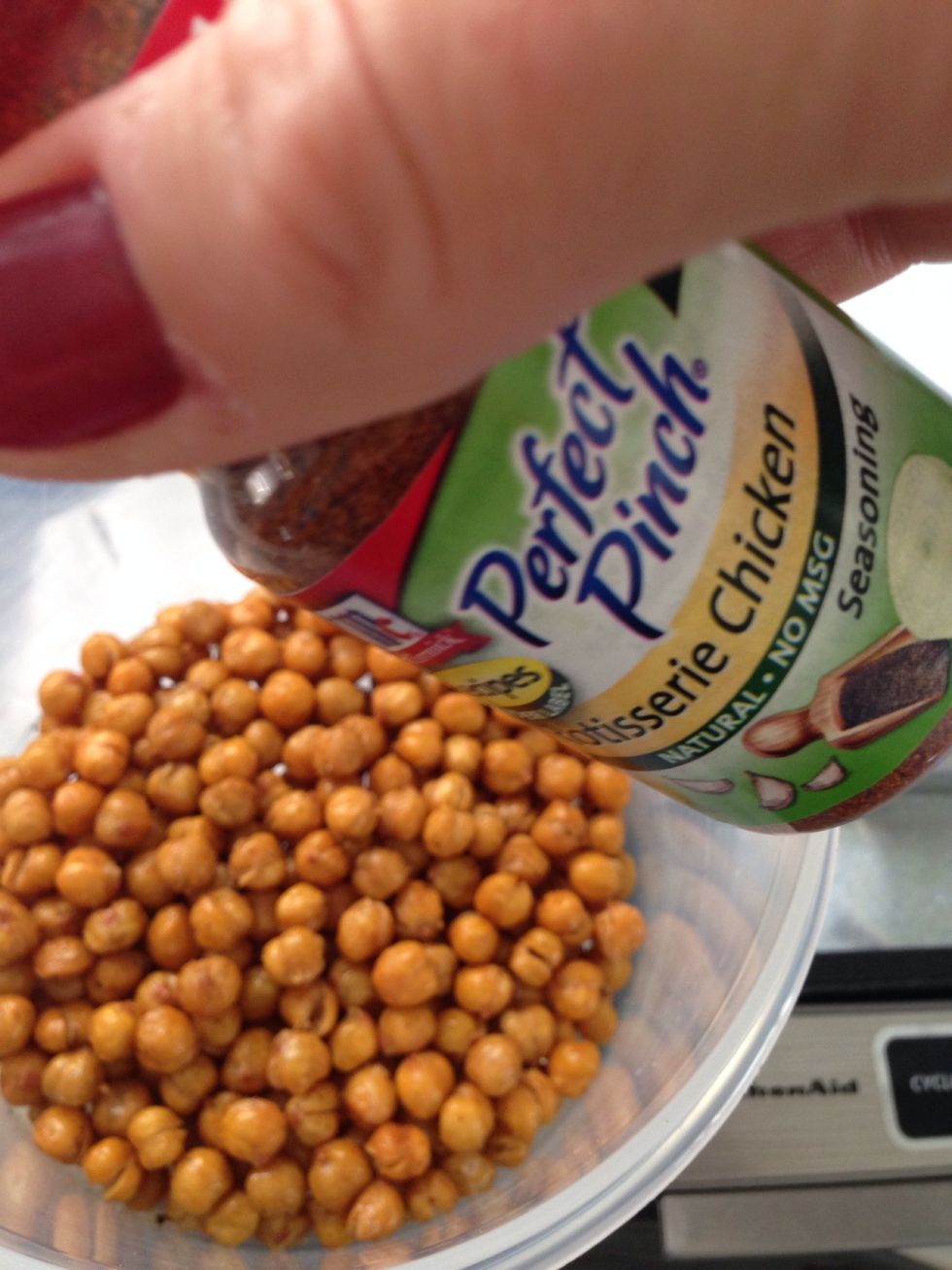 Remove from oven and place in a bowl. Spice em up. I use the McCormick rotisserie chicken seasoning. Even though this ain't chicken, it's a nice blend of onion, paprika & garlic. I also added salt.