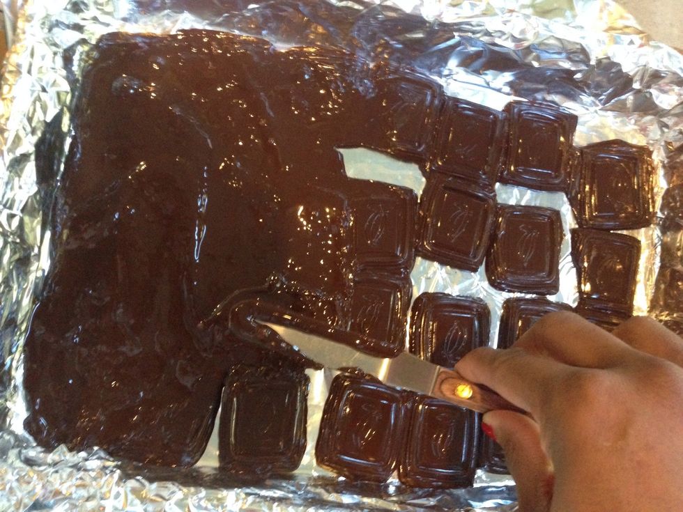 Remove from oven, smooth with spatula or knife.