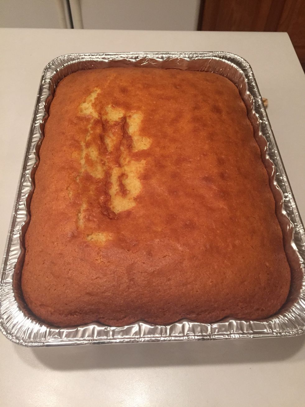 Remove from oven to cool and gently remove foil on top. It's ok if some of the top sticks to the foil. (I used a small spatula to help me separate the foil from the bread.)