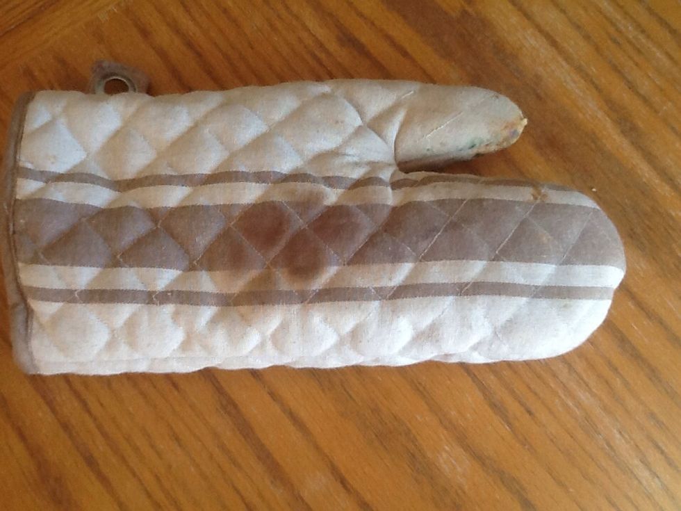 Remove from oven with an oven mitt.