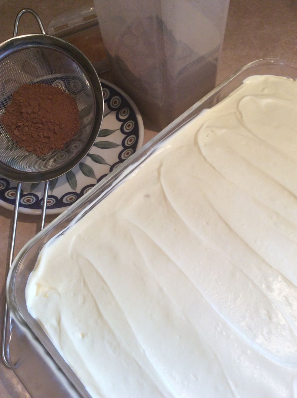 Remove from refrigerator. Using a sieve, dust with cocoa.