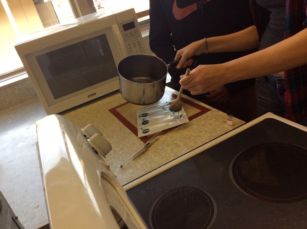 Remove from the heat and add flavoring extract/oil and any food coloring. Note: Vanilla extract won't retain the flavor like proper candy extracts!