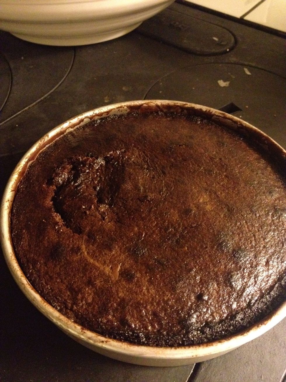 Remove from the oven and let it cool in the tin for 10-15 minutes. No need to test this, we're not making a sponge cake i.e. its meant to be loose in the middle.