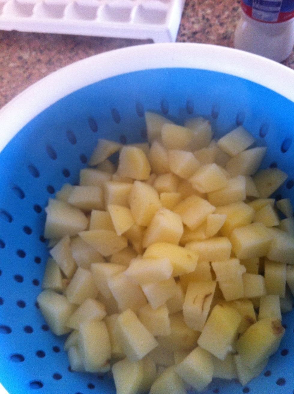 Remove from water and mash with milk, butter, pepper and cheese, season with salt and pepper