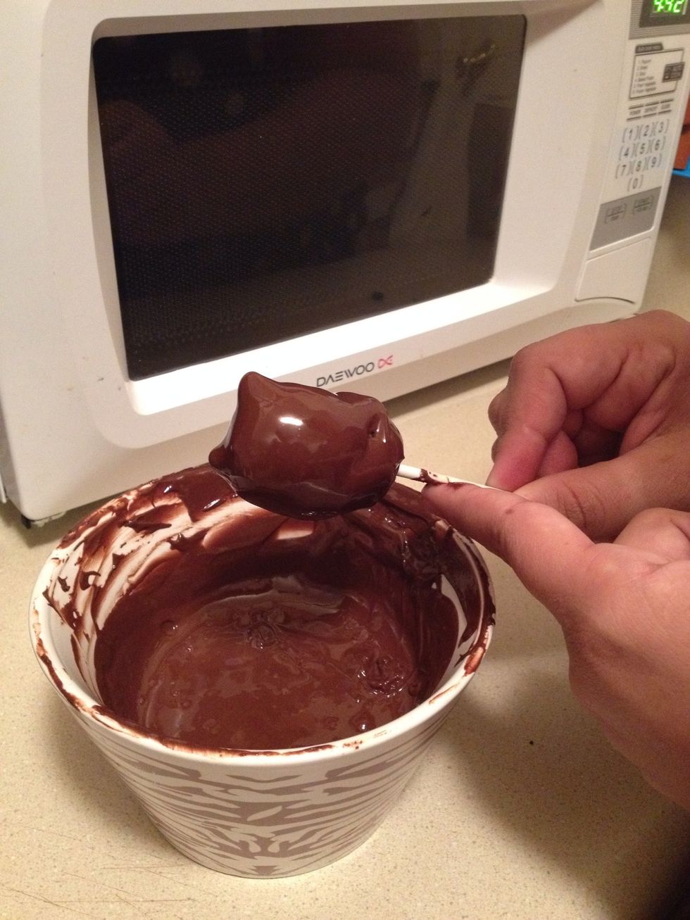 Remove & gently tap off any excess coating. Place in the Styrofoam block to dry.