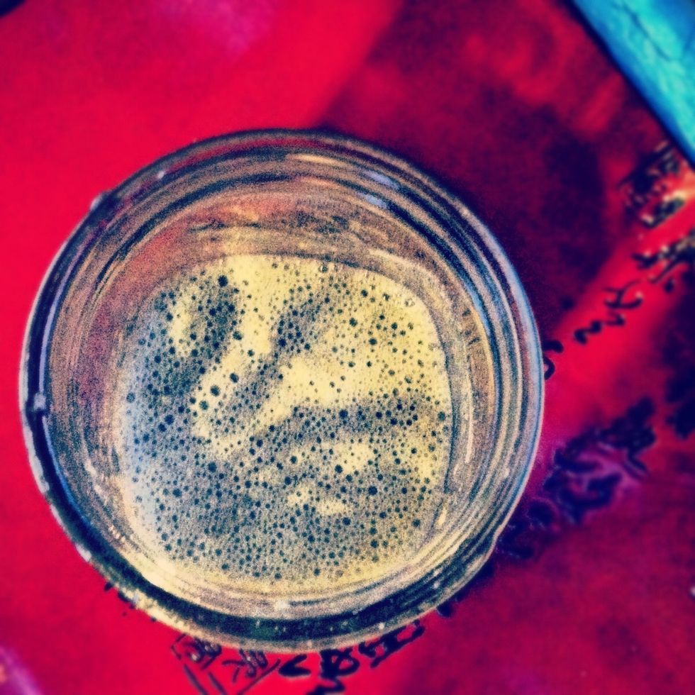 Remove half of the starter and throw it away. Now add in your daily measure of flour and water. These bubbles are proof that our little Yeasties are getting to work. Cover and wait till tomorrow.