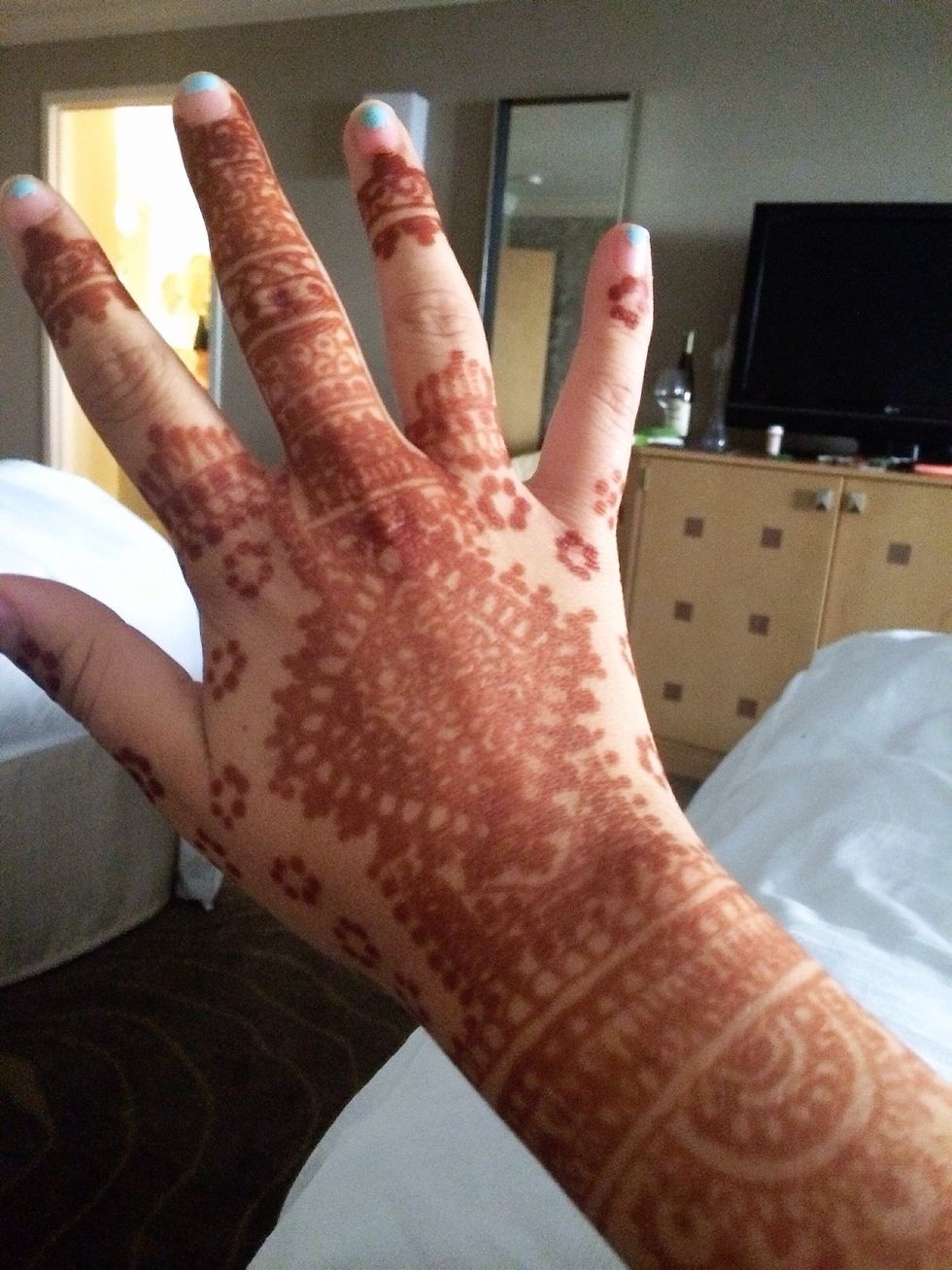 Remove hard paste with cotton ball and vegetable oil. The color will darken after the first 24 hours and become a dark brown.