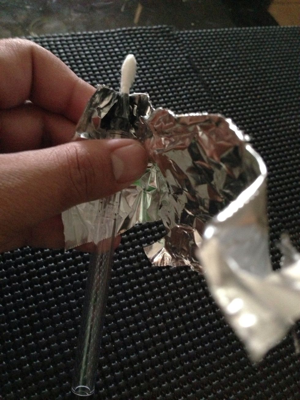 Remove ink and put earbud in pen. Cut in half if it doesn't fit. Put scotch tape to hold it permanent