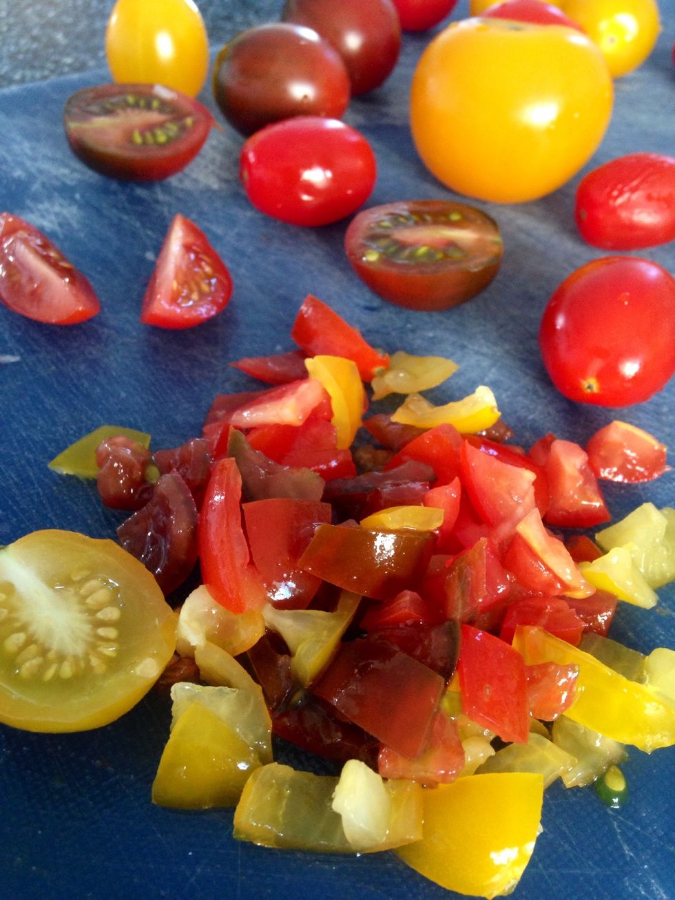Remove inner seeds from the tomatoes before chopping.