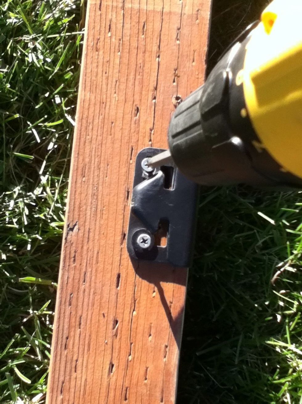Remove latches or hinges from old post and place on new post. You are done.