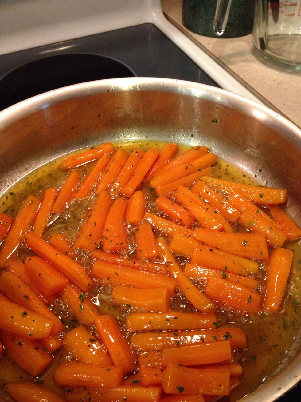 Remove lid and increase heat to medium, stir in maple syrup & a squeeze of lemon juice. Cook for 2-3 minutes, then season with salt and pepper. Add thyme, mix we'll & serve