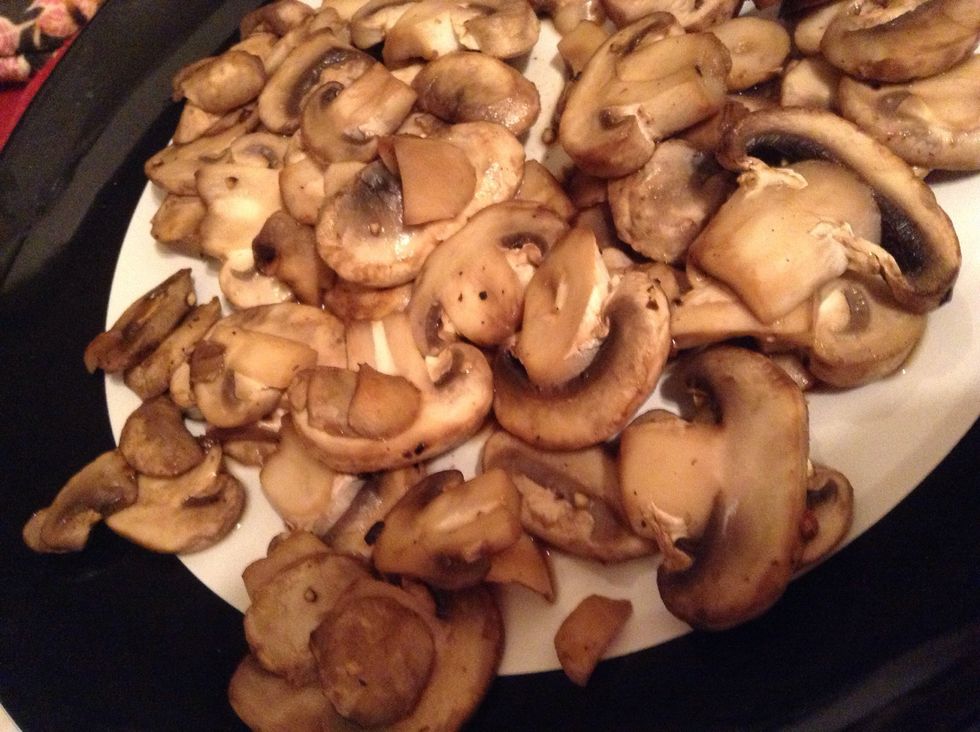 Remove mushrooms from pan and let sit on plate while following other steps