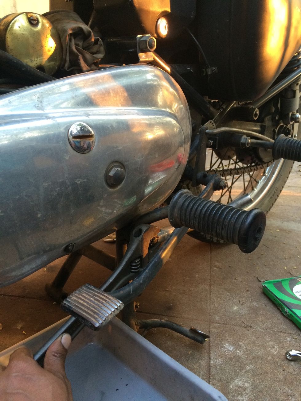 Remove or loosen the footrest nut