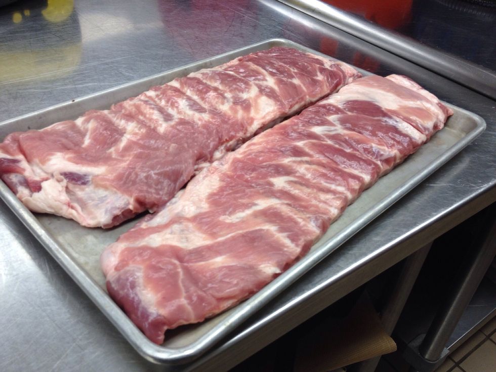 Remove packaging from ribs and place on pan