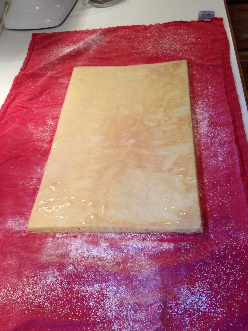 Remove pan and you should have sponge parchment side up!