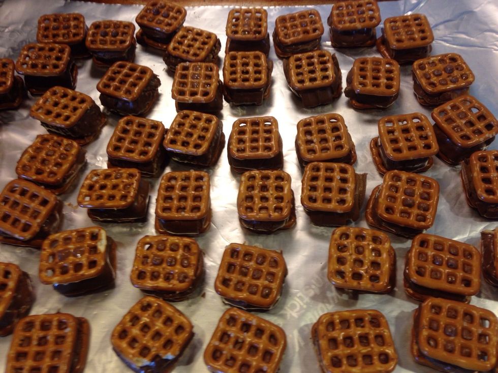 Remove pan from oven and add a top pretzel. Gently push the top piece into the chocolate, Let harden.