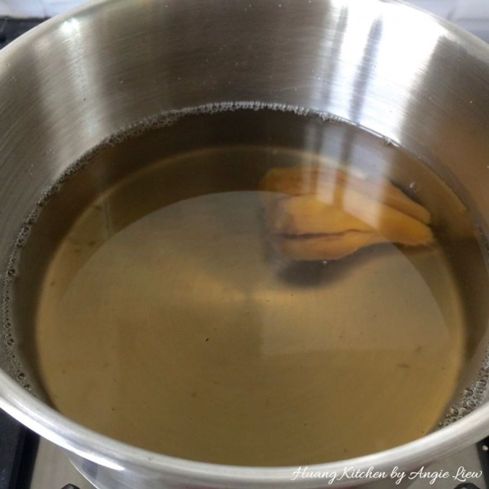 Remove pandan/screw pine leaves and allow syrup to cool.