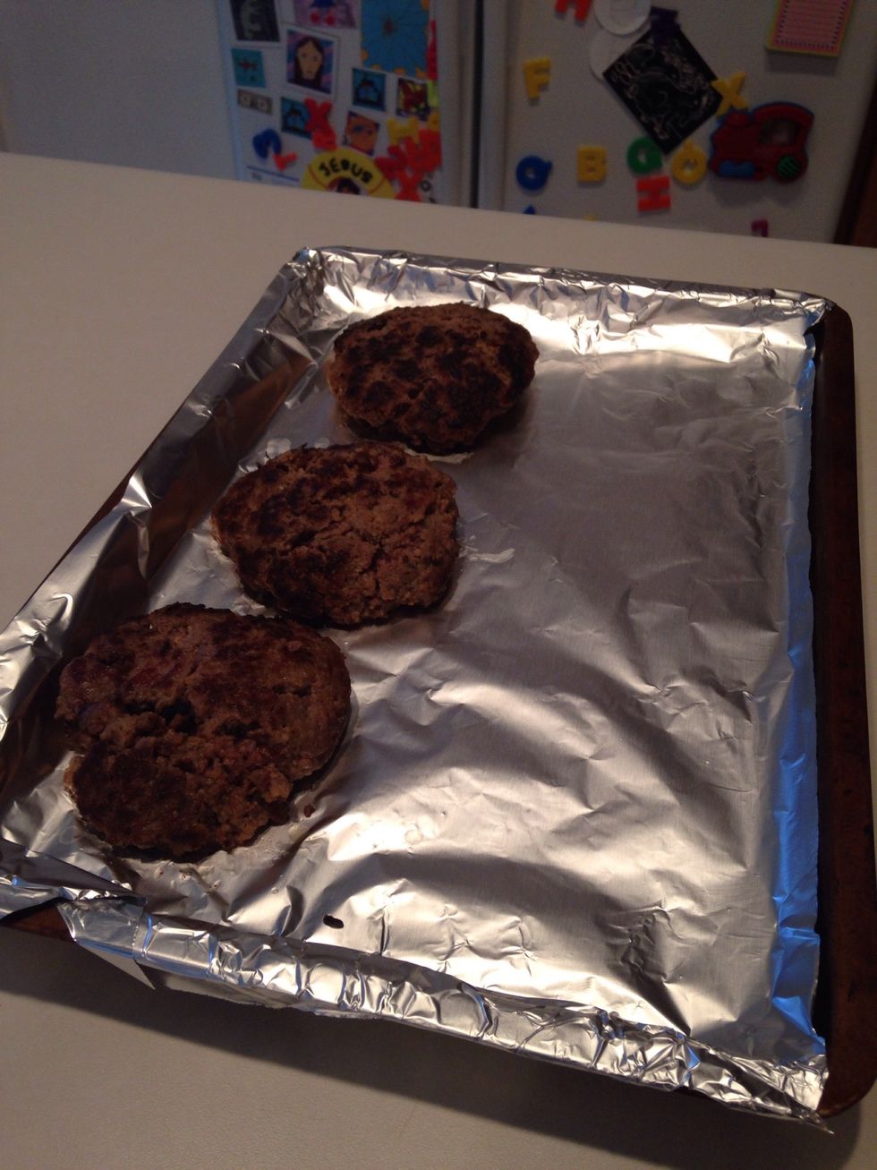 Remove patties and place on foil covered baking pan.