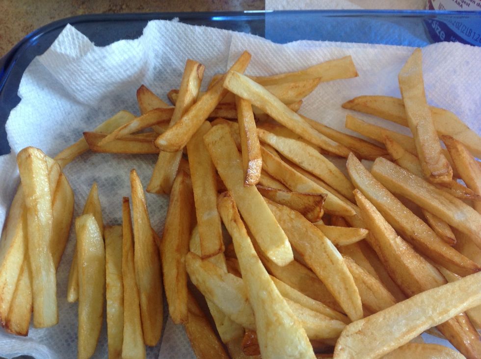 Remove potatoes when cooked, pat dry with paper towels and add salt to taste