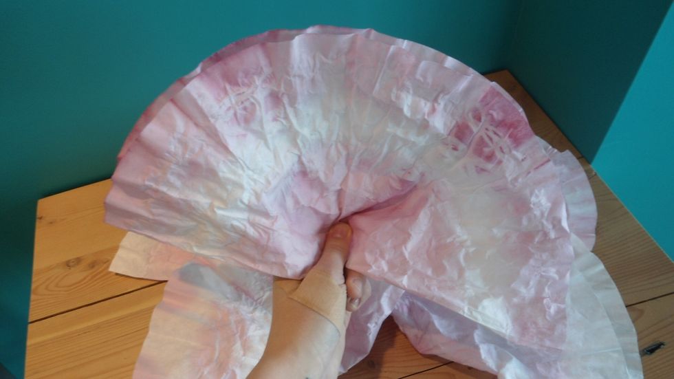 Remove rubber bands and smooth filter out.