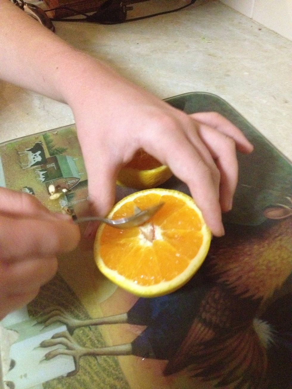 Remove seeds with a teaspoon.