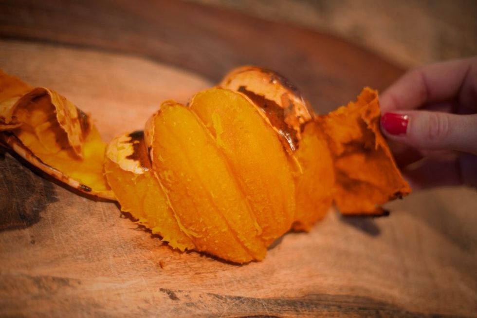 Remove skin, dice, and puree. Combine olive oil and onion in pot on medium heat until translucent. Add the spices and simmer 1 minute. Add pumpkin and broth, simmer for 5 min. Add in milk and simmer.