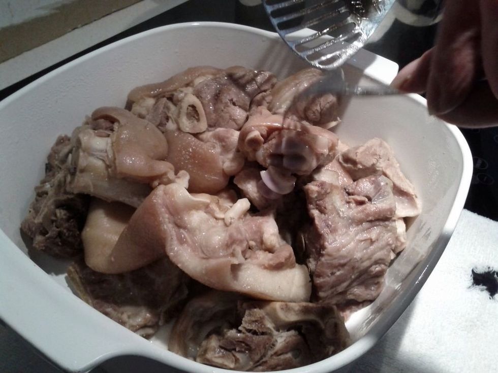 Remove some of the meat from the pot to make room for the vegetables to steam and cook in the stock.