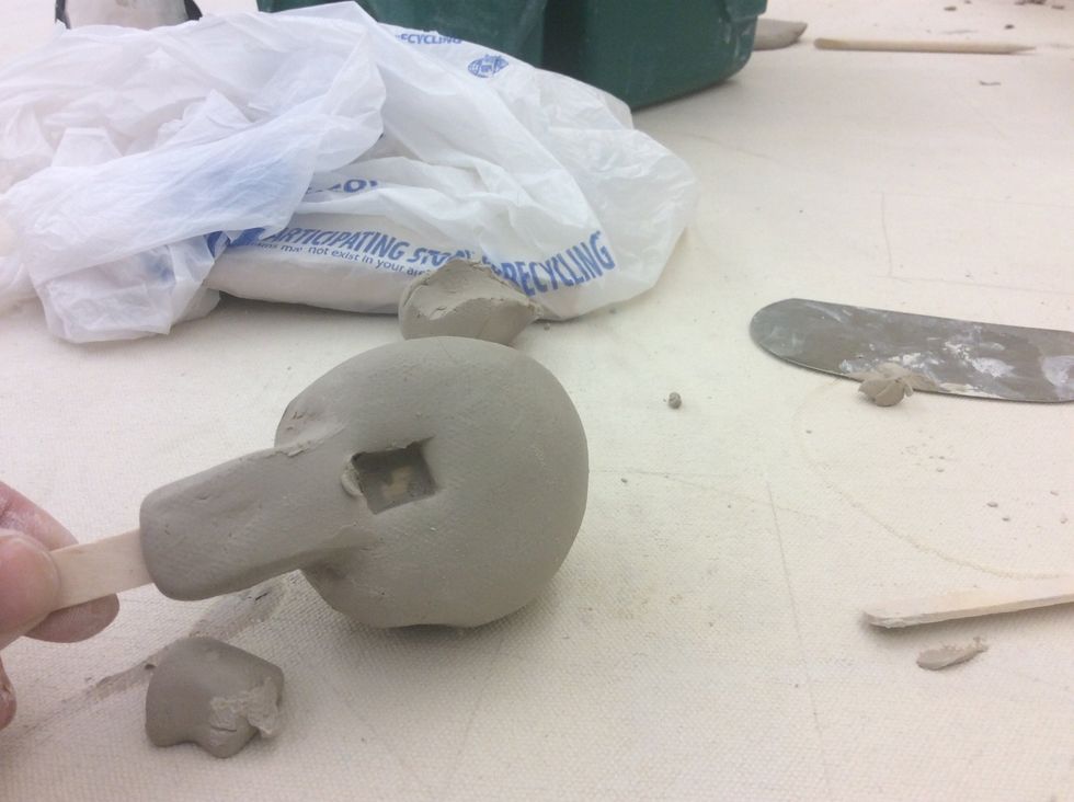 Remove square piece.