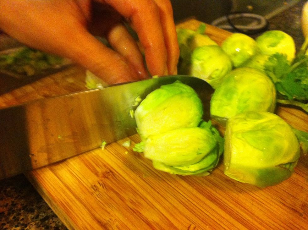 remove stems from Brussels and chop lengthwise into discs.