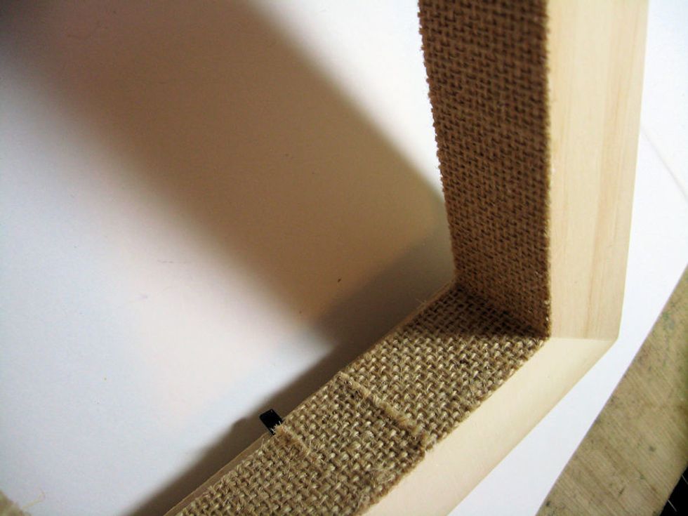 Remove the back from the shadowbox frame and set aside. Measure the depth of the frame and cut burlap strips to fit. Attach with collage or decoupage medium