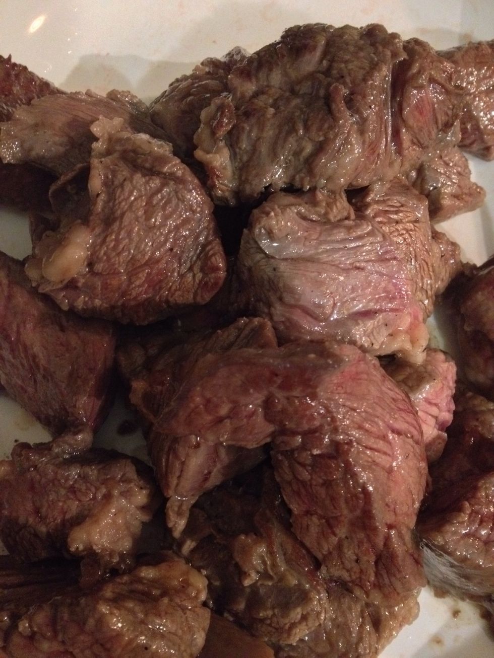 Remove the beef and saut\u00e9 the onion.