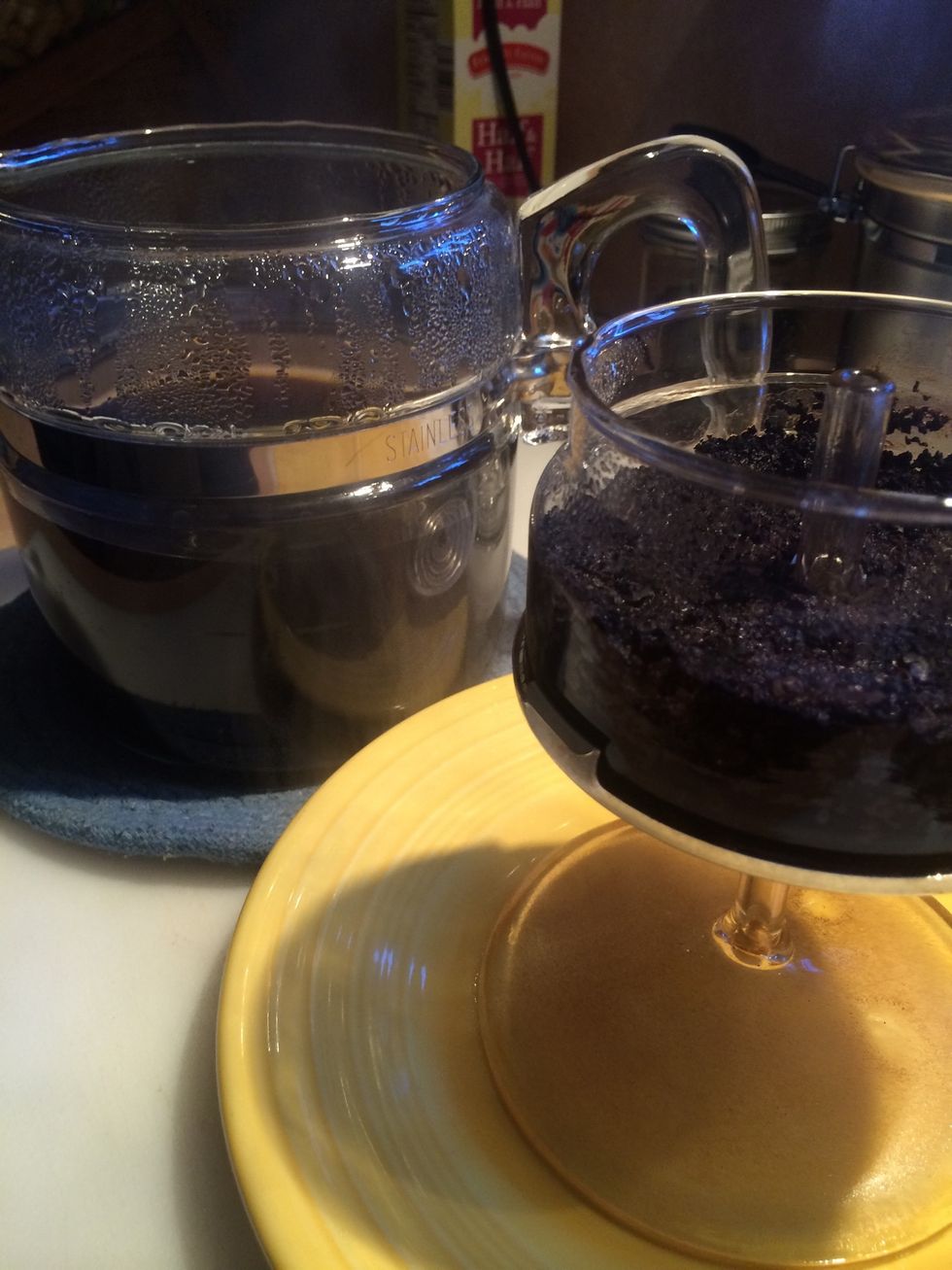 Remove the brew basket and perk stem from pot. Be careful, this is hot!