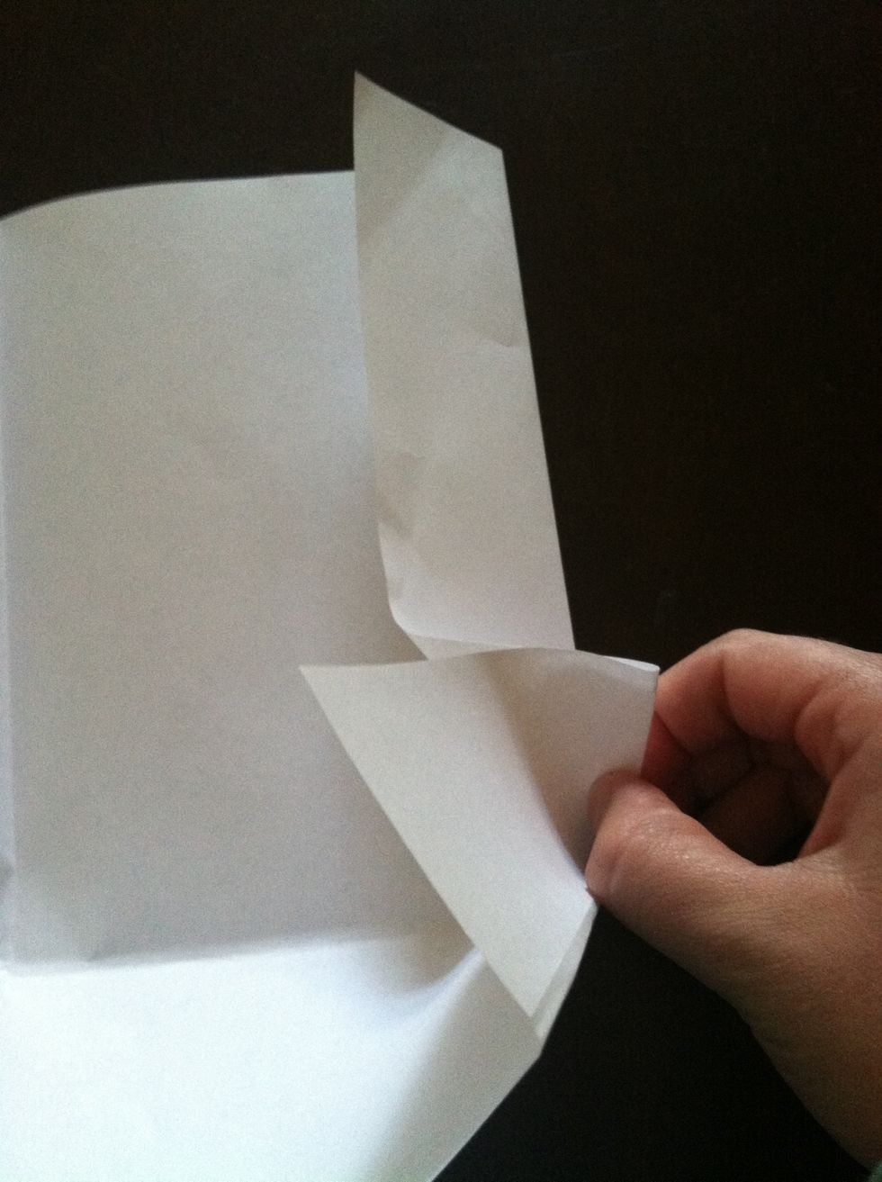 Remove the cd and at the middle crease pinch the edges to bring the fold up