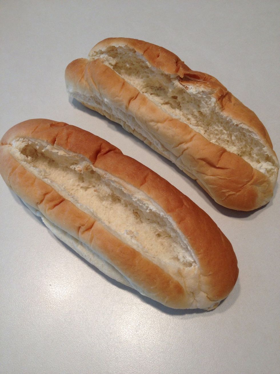 Remove the center of each hoagie roll to make a "boat" for your ingredient. Make sure you leave a good, high border all the way around or else your egg mixture will run out the sides.