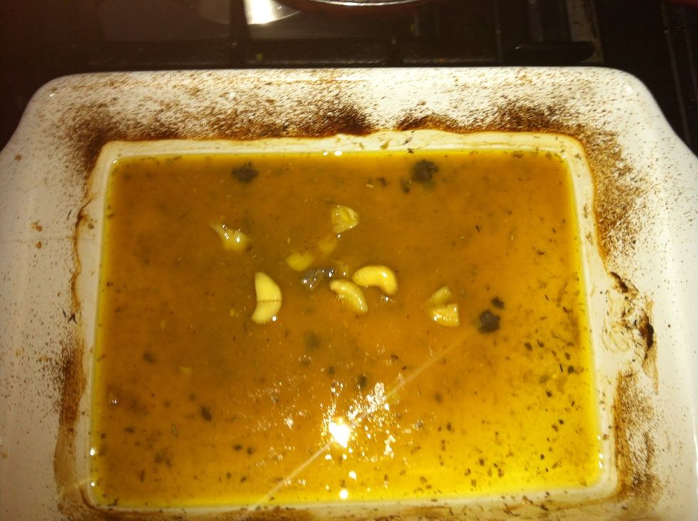 Remove the chicken and lemon and set aside, peel the garlic cloves and transfer the sauce with the garlic in a blender or food processor.