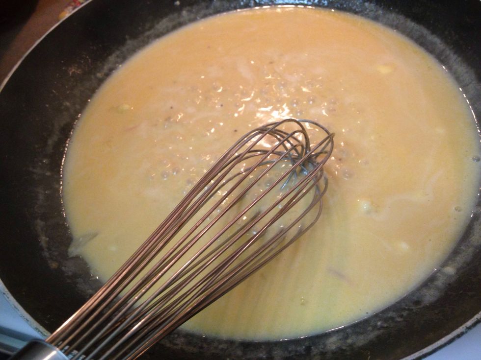 Remove the chicken, tomatoes, and the onions from the pan. Add beer, whole butter, flour, and the warm heavy cream in that order. Whisk continuously till smooth and thick.