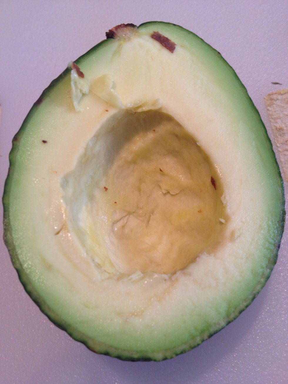 Remove the core. As you will soon learn; you may want to make sure you core out enough extra to hold the entire egg.