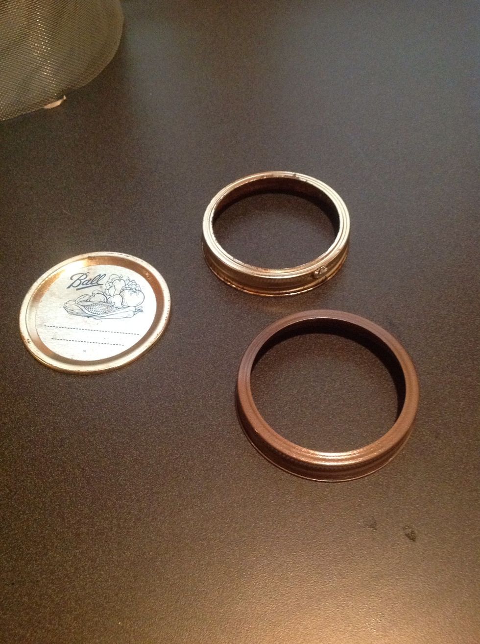 Remove the flat seal out of the ring. You won't need this. Spray paint your ring if you like. If you're making jars for multiple kids think about using different colors of paint.