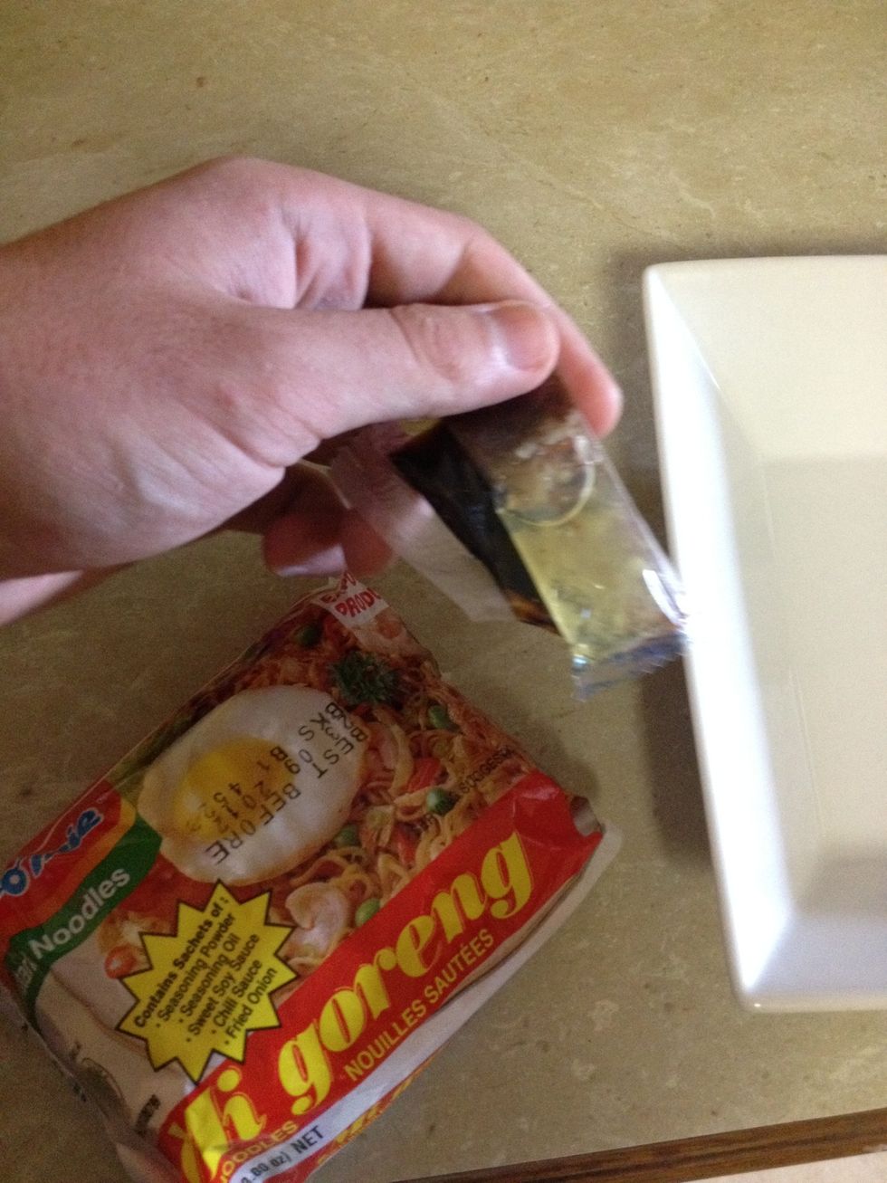 Remove the flavouring packets. This is the chilli, oil and soy sauce.