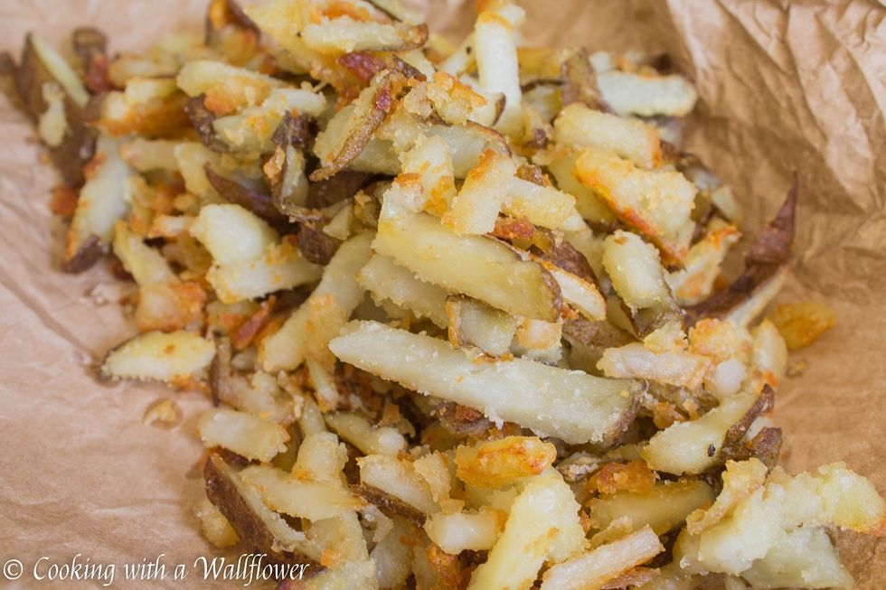 Remove the fries from the oven and allow them to cool for a few minutes.