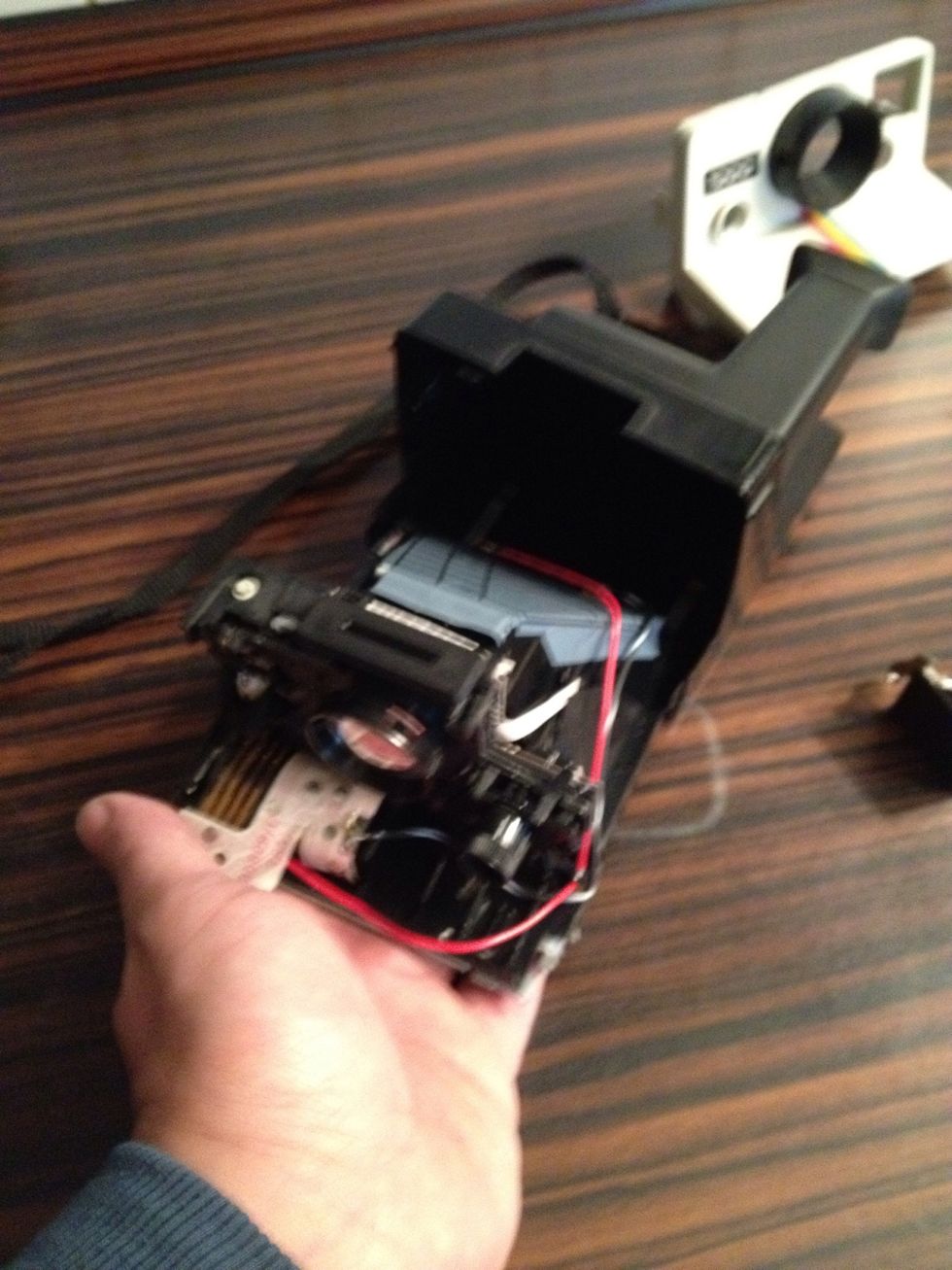 Remove the inner workings by pulling them out