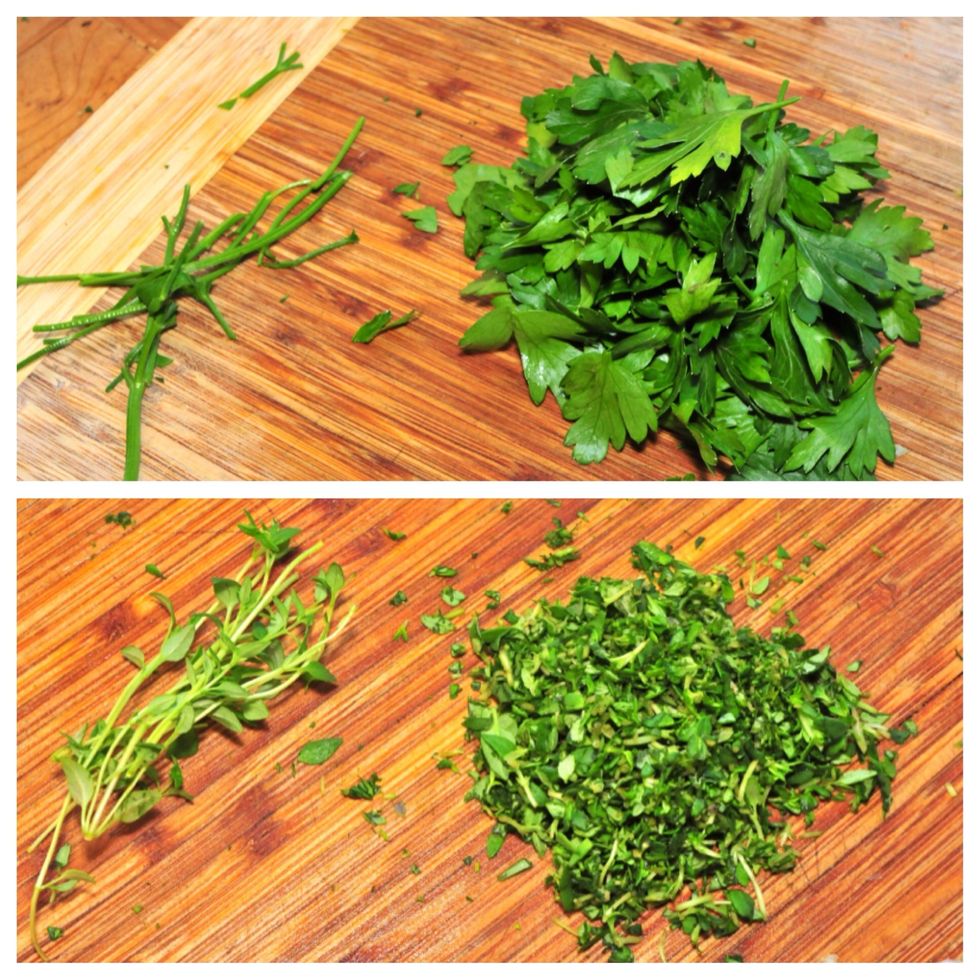Remove the leafs from the stem of both the parsley and the time then roughly chop them.