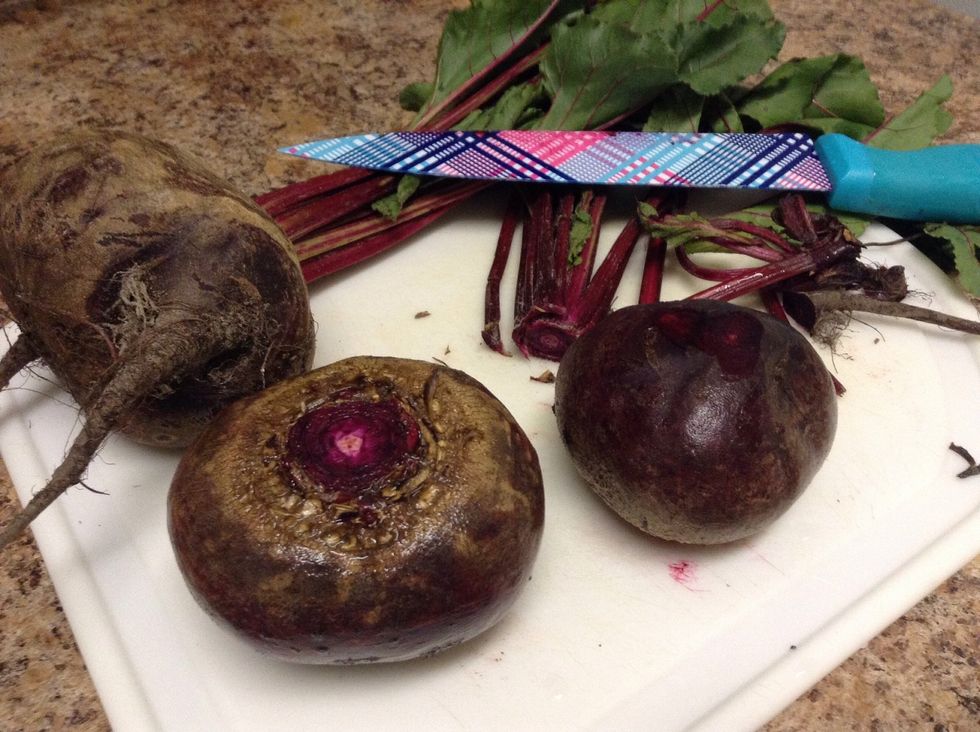 Remove the leaves and roots from the beets and wash them to remove as much dirt as you can.