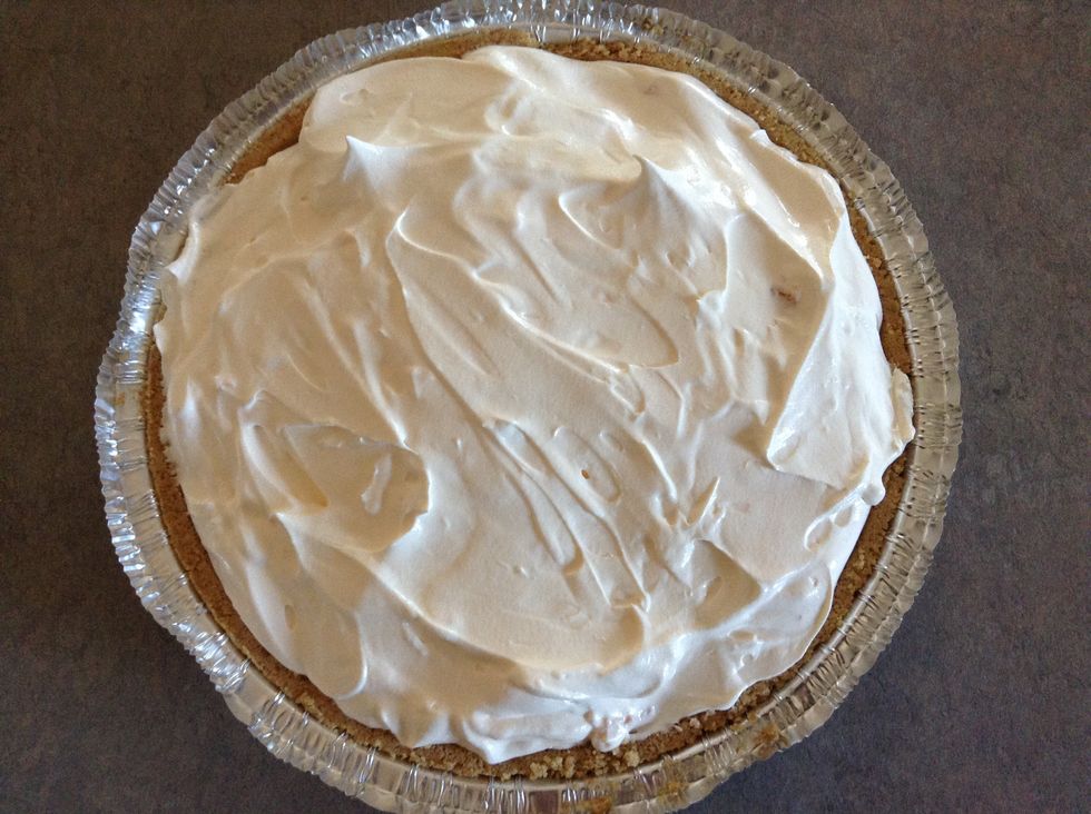 Remove the lid (covering pie crust) and wash it! Sorry I forgot to take a picture of that step! Then scoop your Cool Whip/Yogurt mixture into the pie crust.