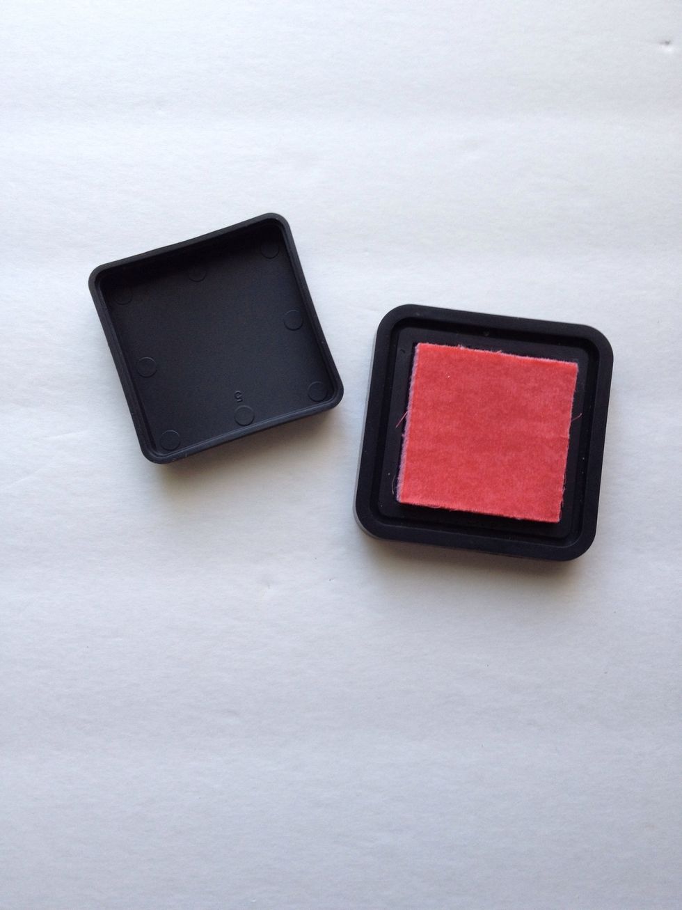 Remove the lid from the base of your ink pad.