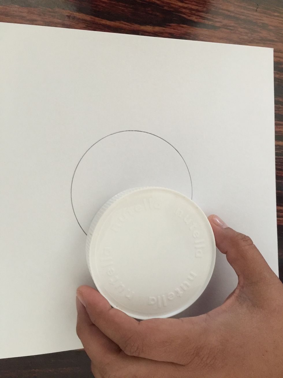 Remove the lid from the paper.