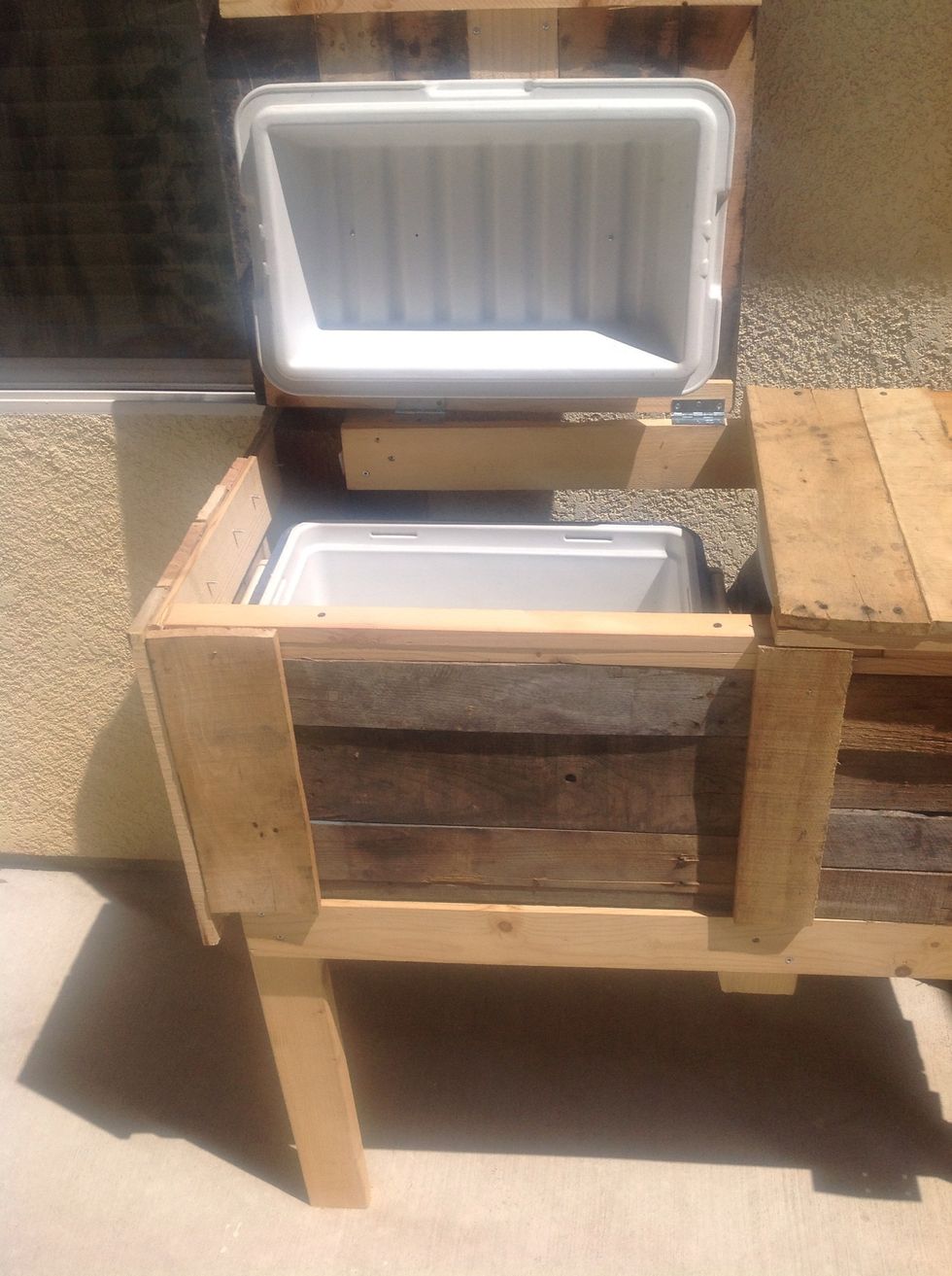 Remove the lids from the plastic cooler and attach to wood lids