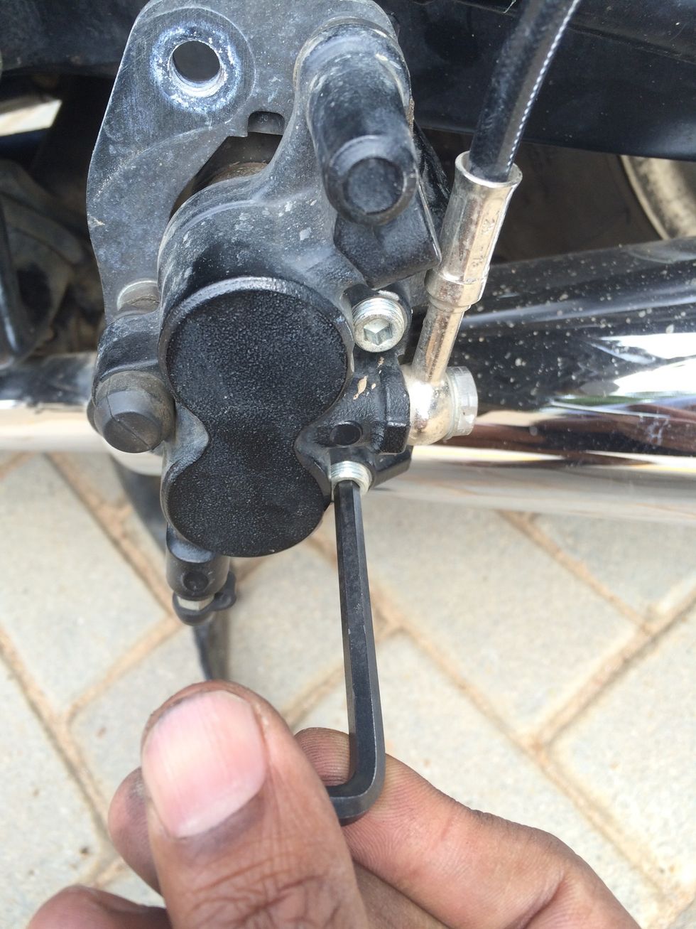 Remove the loosened retaining pins